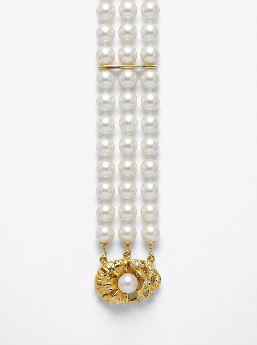 detall de braçalet de perles obert