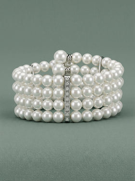 brazalete de perlas blancas con apliques de plata y circonitas