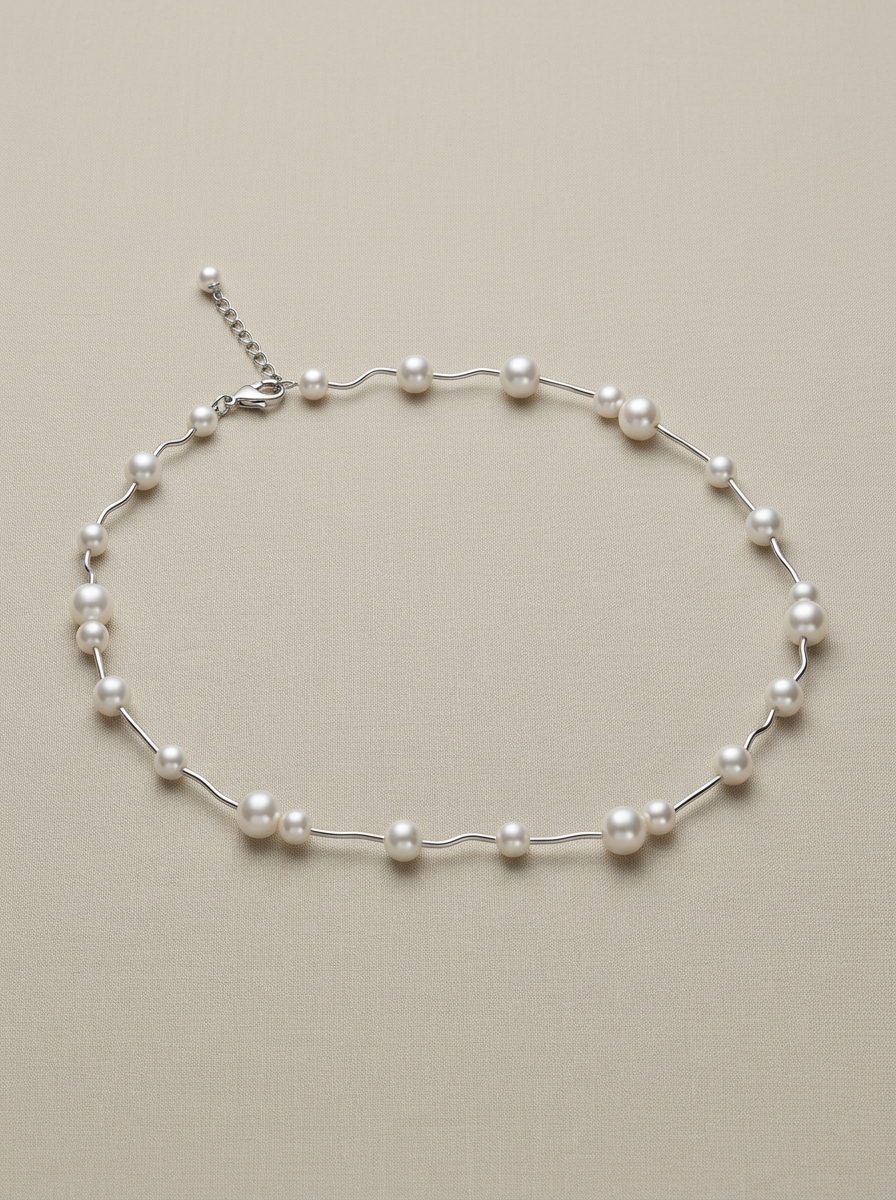gargantilla de plata de llei amb perles cultivades blanques. 