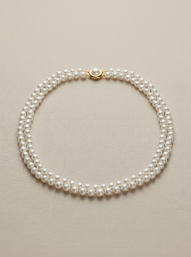 Collier deux rangs de perles blanches avec fermoir doré