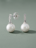 Silver earrings with set cubic zirconia and a white pearl