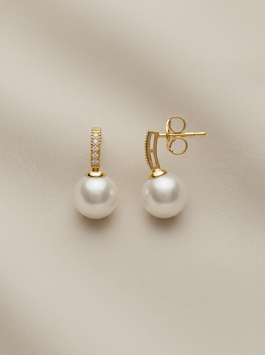 Arracades d'or 18k amb perla blanca i circonites