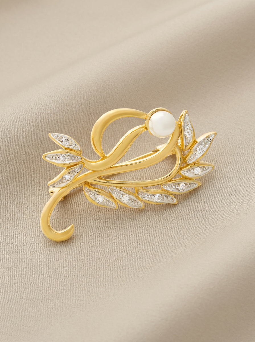 Pearl brooch with cubic zirconia