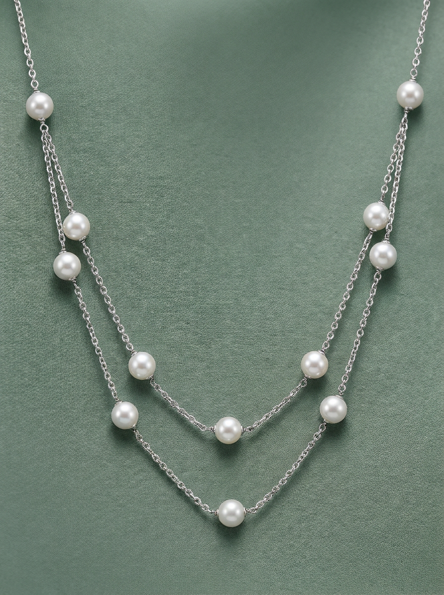 Collier double chaîne avec perles blanches