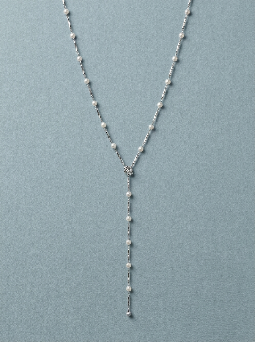 collaret de plata banyada en or amb detalls de perles 