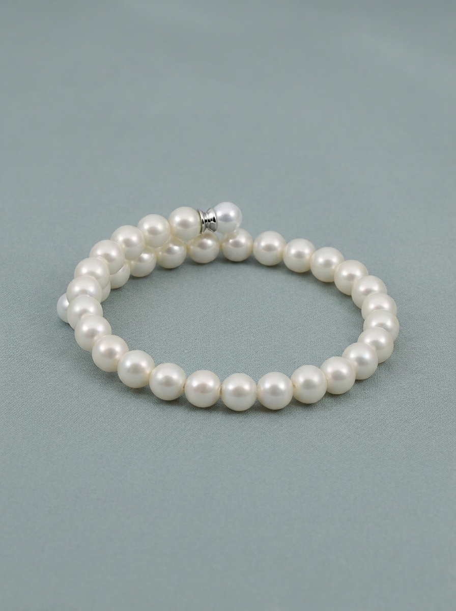 Rigid pearl and silver bracelet