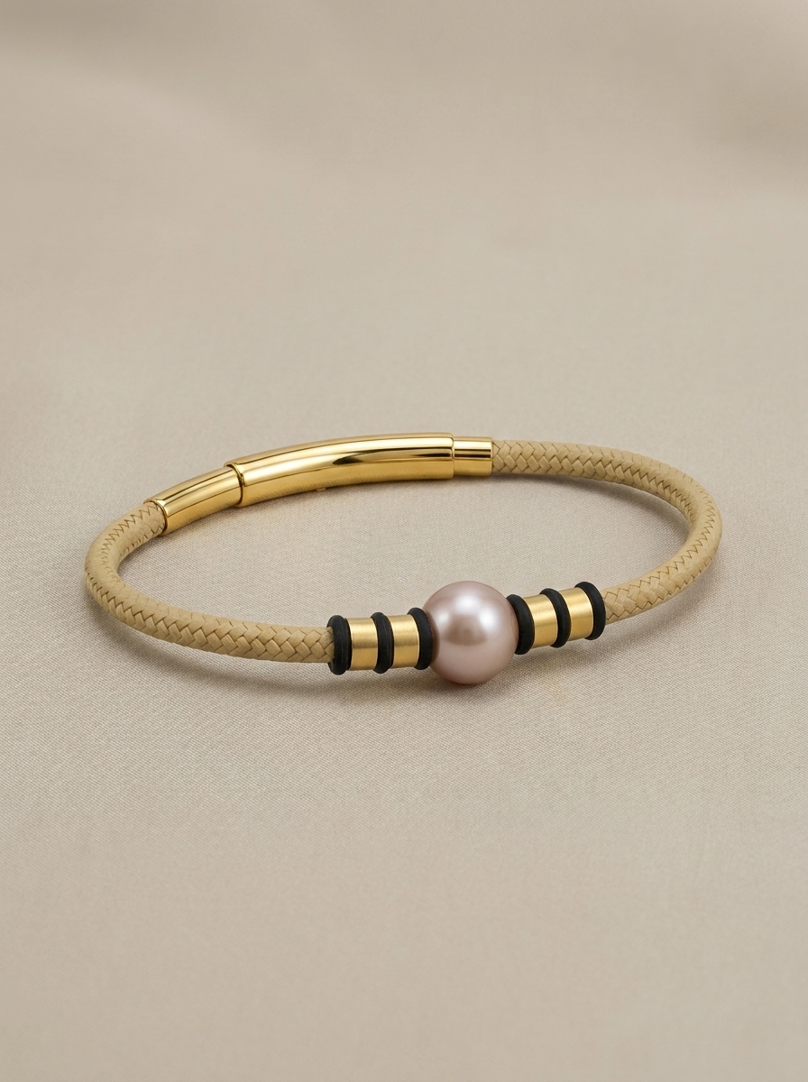Beige cord bracelet with a copper pearl
