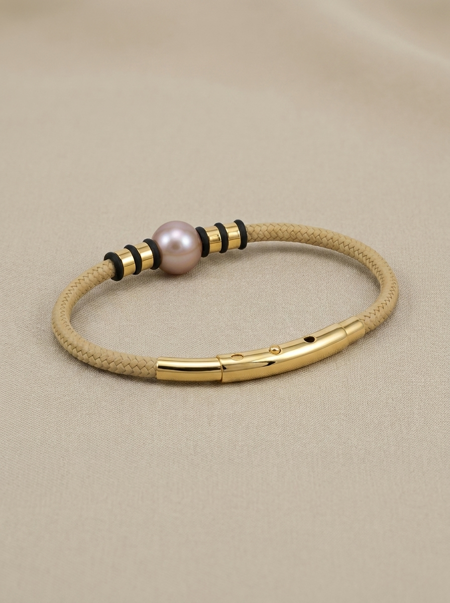 Nautical bracelet with a copper pearl and beige cord