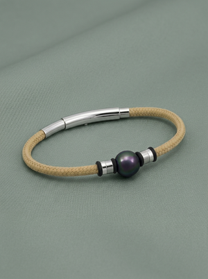 Beige cord bracelet with a black pearl