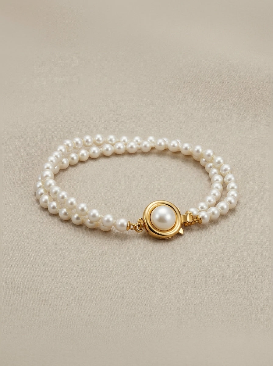 Bracelet de perles blanches plaqué or 18 carats