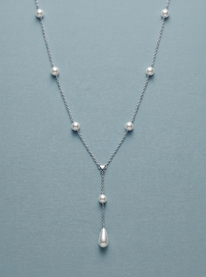 Necklace with round and teardrop pearls on a silver chain