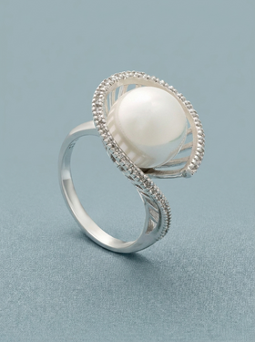 anillo de plata con perla y circonita